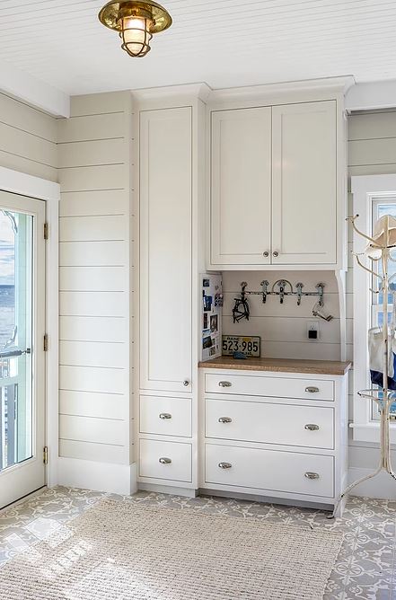 a beautiful white mudroom in Maine